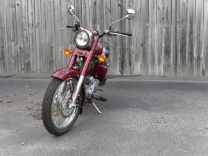 <the 2012 Royal Enfield Classic in red>