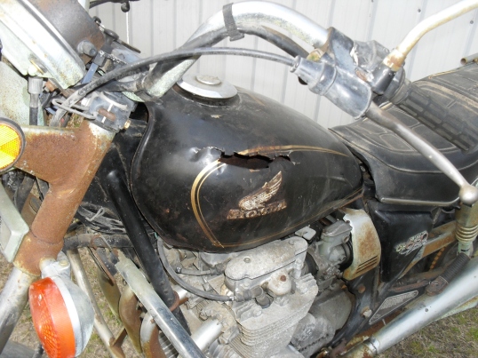 seriously rusted out motorcycle fuel tank