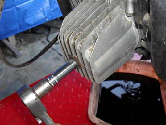 removing the oil filter bolt