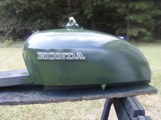<a green Honda gas tank>