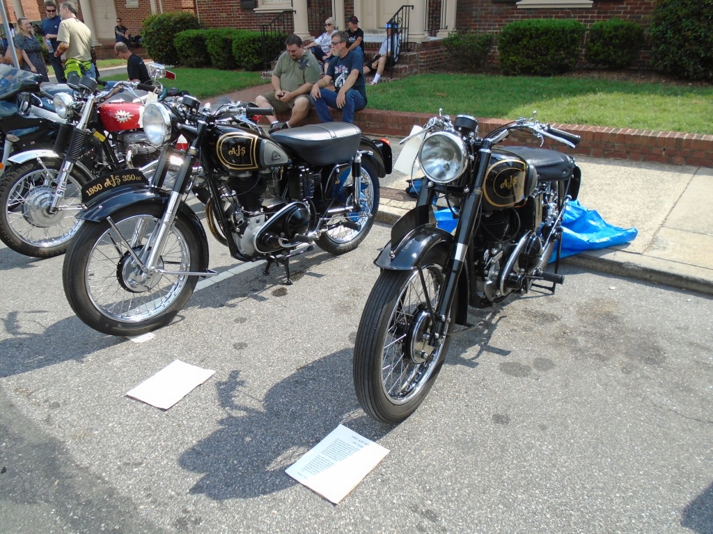 < antique AJS motorcycles>