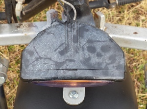 <airsick skull pile on minibike light>