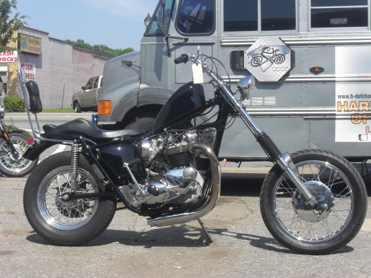 <one fine custom Triumph motorcycle>